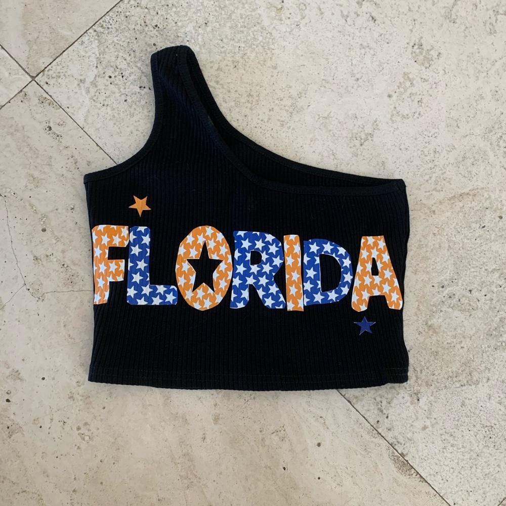 One shoulder UF tailgate crop top.